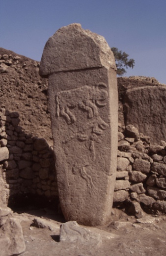 Gobekli Tepe pillar with a bull, fox, and crane